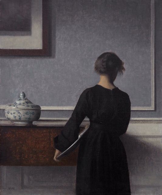 Interior com jovem vista de costas - Vilhelm Hammershoi